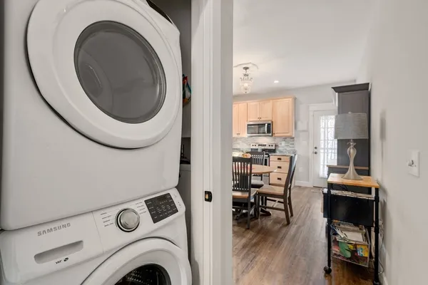 a view of a kitchen with washer and dryer