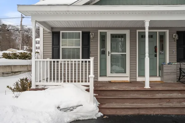 a front view of a house with a porch