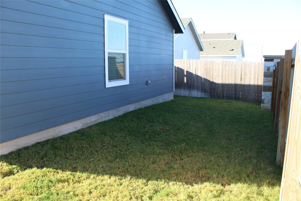 205 Marty Allen Loop Jarrell, TX 76537 - Photo 21 of 22 a view of a backyard
