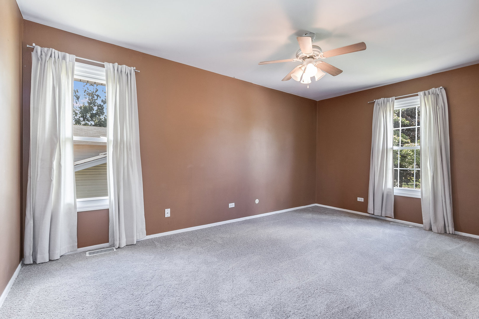 429 West Briarcliff Road Bolingbrook, IL 60440 - Photo 18 of 25 a view of an empty room with a window