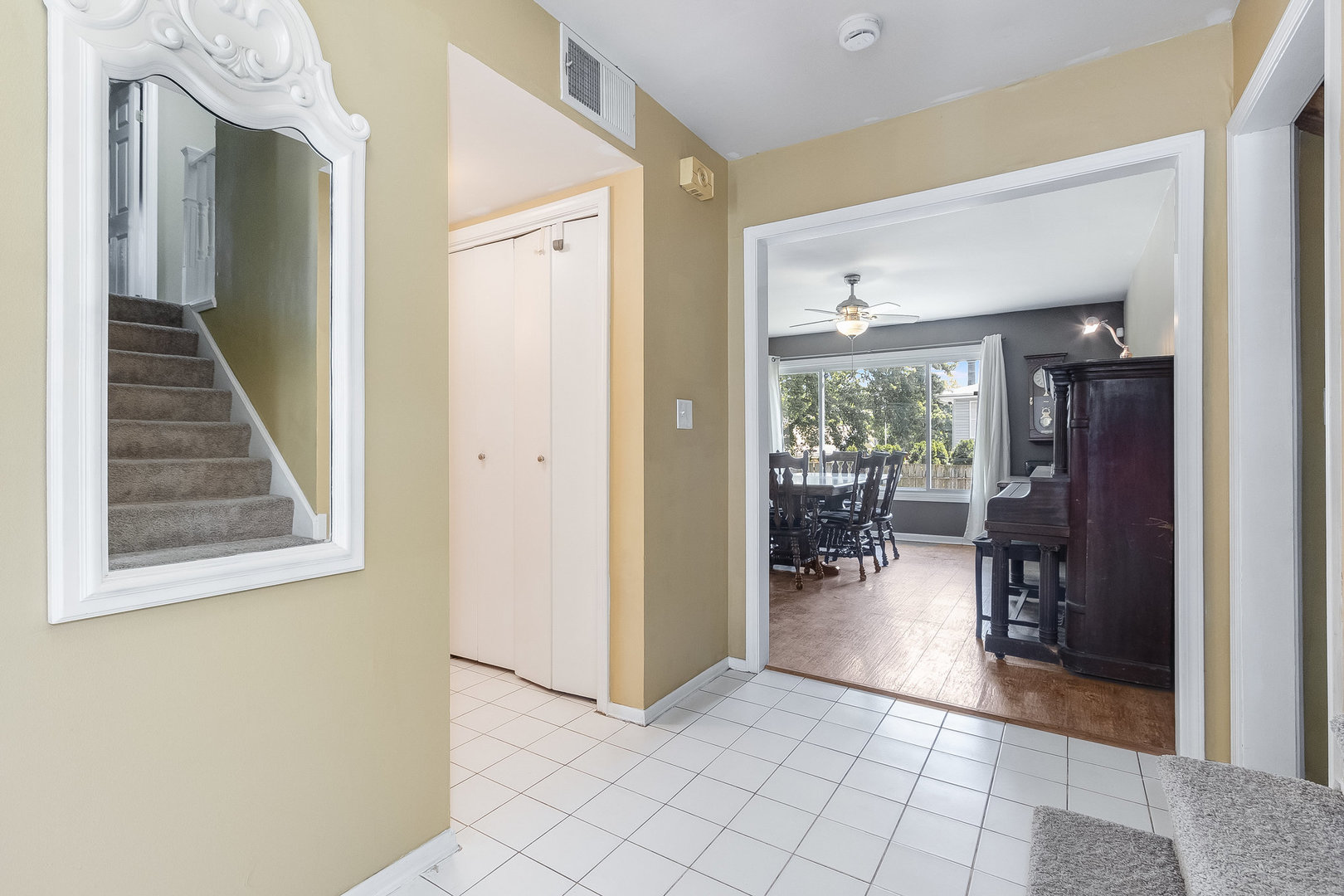 429 West Briarcliff Road Bolingbrook, IL 60440 - Photo 3 of 25 a view of a hallway view with wooden floor and furniture