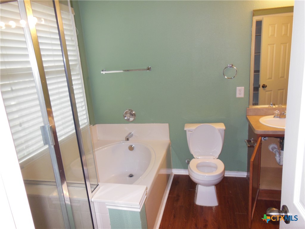 5244 Brookline Schertz, TX 78108 - Photo 11 of 24 a bathroom with a sink and a toilet