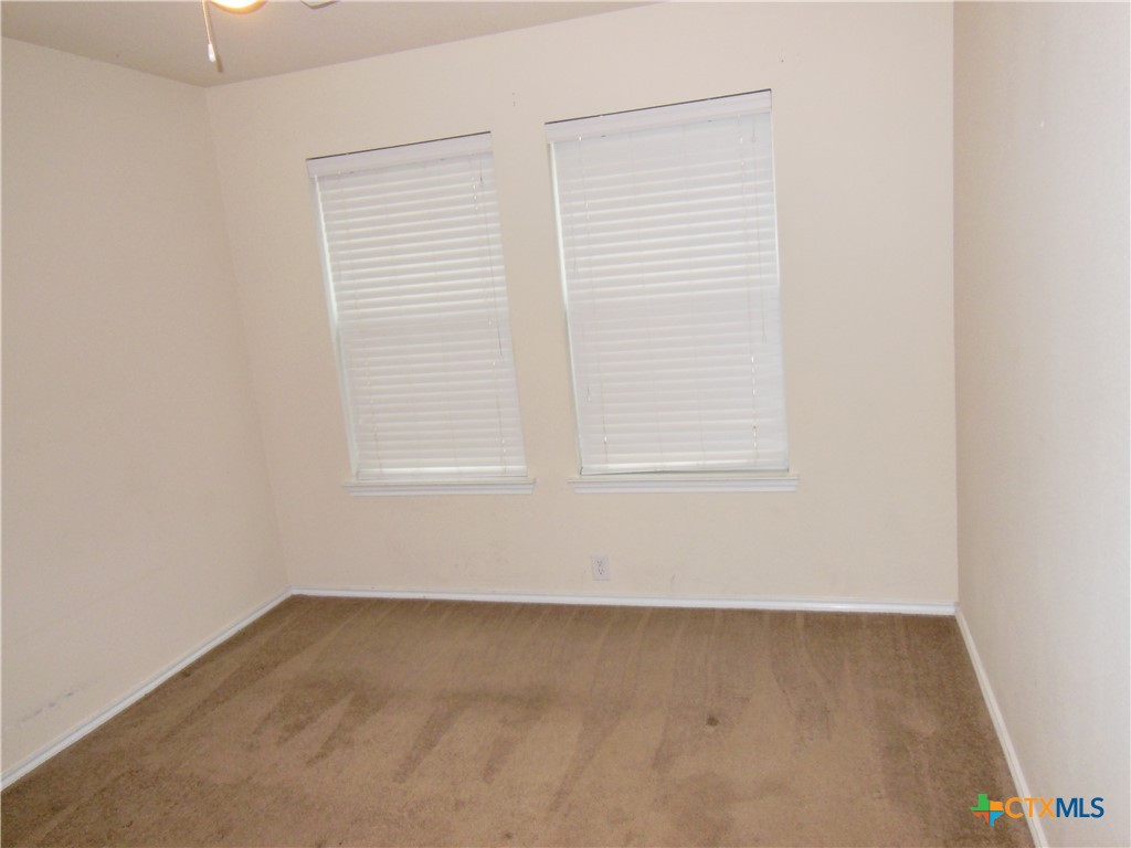 5244 Brookline Schertz, TX 78108 - Photo 17 of 24 an empty room with a window