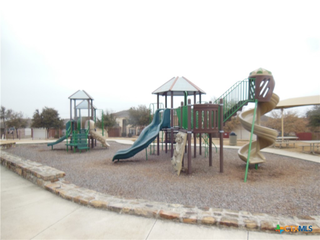 5244 Brookline Schertz, TX 78108 - Photo 21 of 24 a view of a playground with a yard