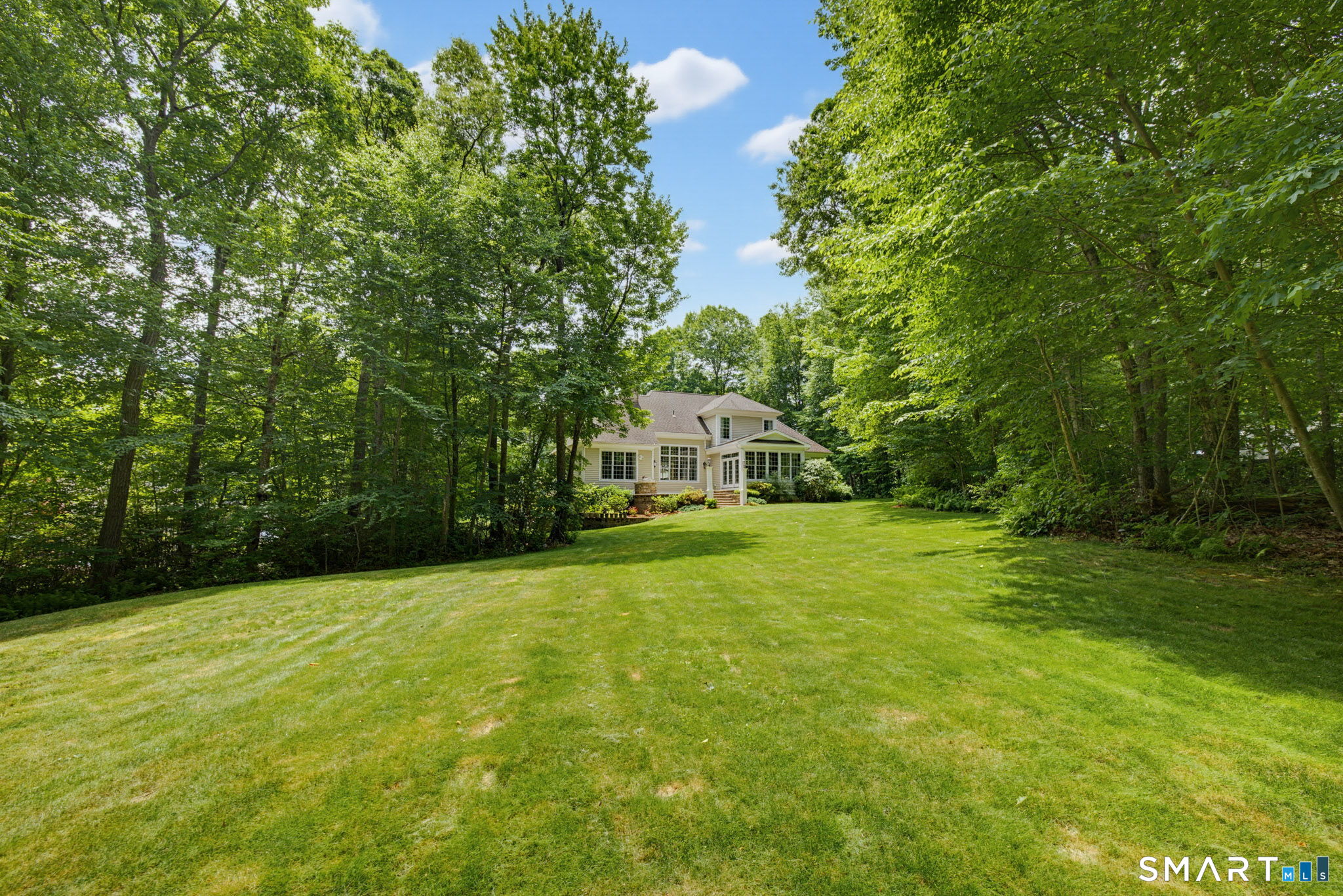 158 Appian Way Coventry, CT 06238 - Photo 6 of 40 a front view of a house with a yard