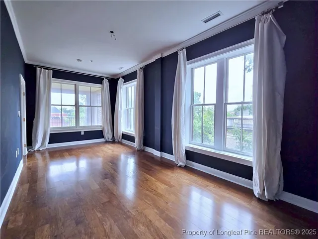a view of livingroom with hardwood floor and window