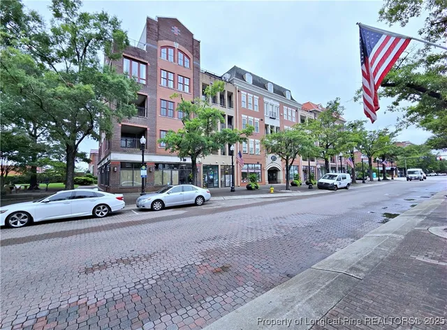 a view of a street with cars