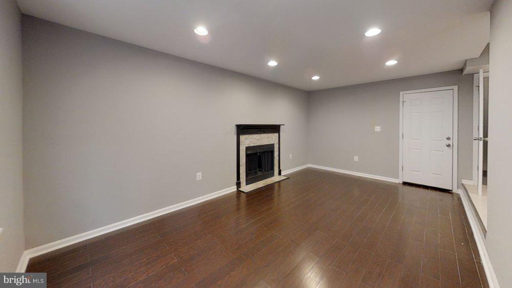 610 Riden Street Odenton, MD 21113 - Photo 7 of 22 Family room with cozy fireplace!