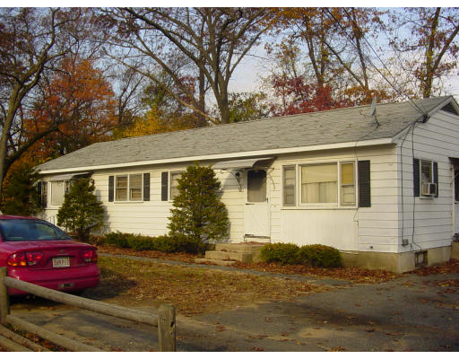 48-50 Gilbert Avenue Springfield, MA 01119 - Photo 1 of 1 a view of a house with a yard