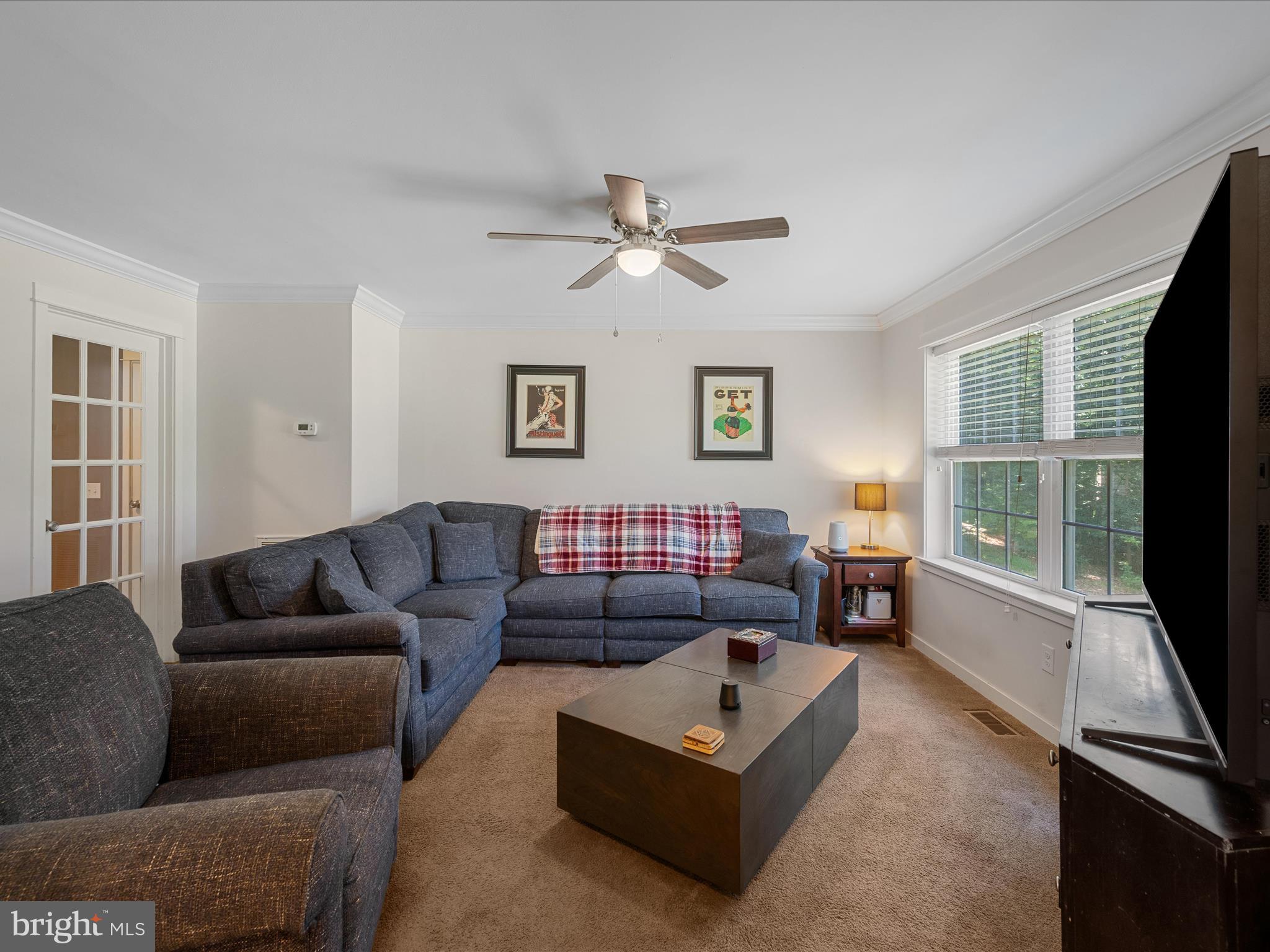 231 Greenfield Road Front Royal, VA 22630 - Photo 14 of 38 a living room with furniture and a flat screen tv