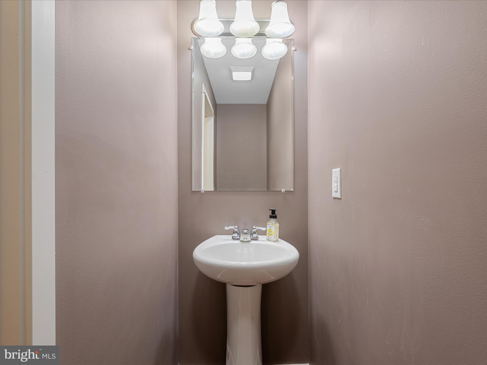 231 Greenfield Road Front Royal, VA 22630 - Photo 18 of 38 a bathroom with a sink and a mirror