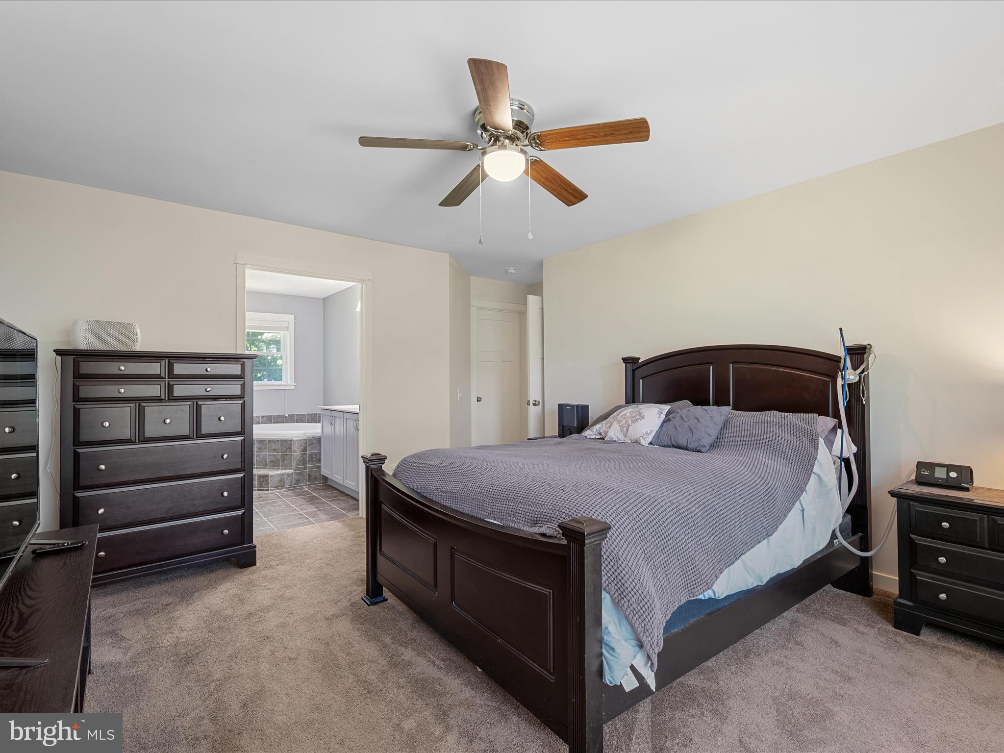 231 Greenfield Road Front Royal, VA 22630 - Photo 21 of 38 a bedroom with a bed and a ceiling fan