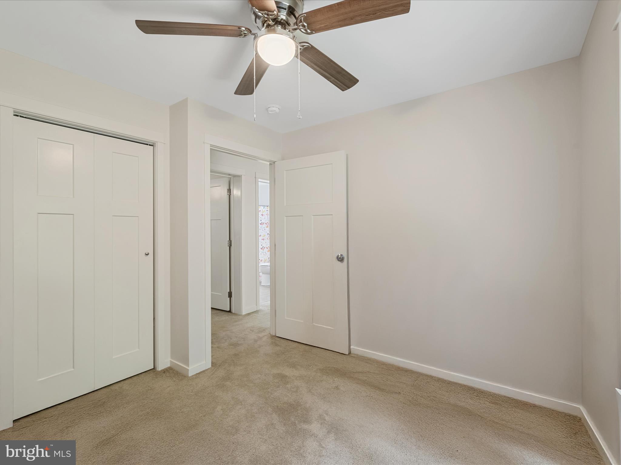 231 Greenfield Road Front Royal, VA 22630 - Photo 28 of 38 an empty room with closet and a chandelier fan