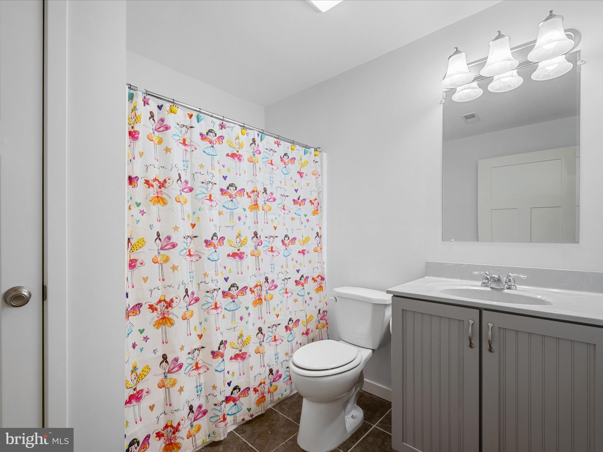 231 Greenfield Road Front Royal, VA 22630 - Photo 29 of 38 a bathroom with a sink a toilet and shower curtain