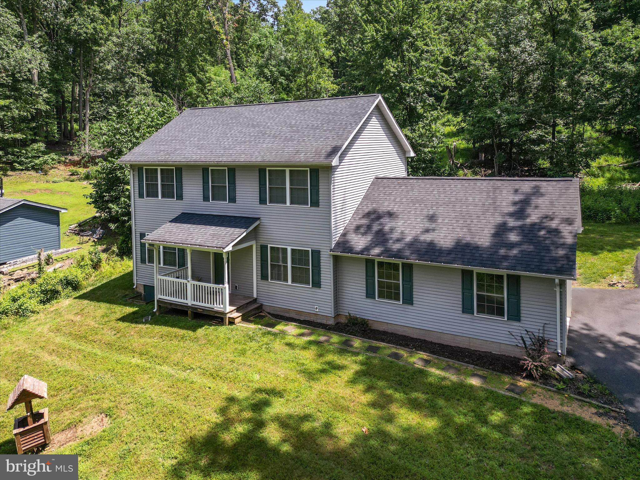 231 Greenfield Road Front Royal, VA 22630 - Photo 33 of 38 an aerial view of a house with swimming pool next to a yard