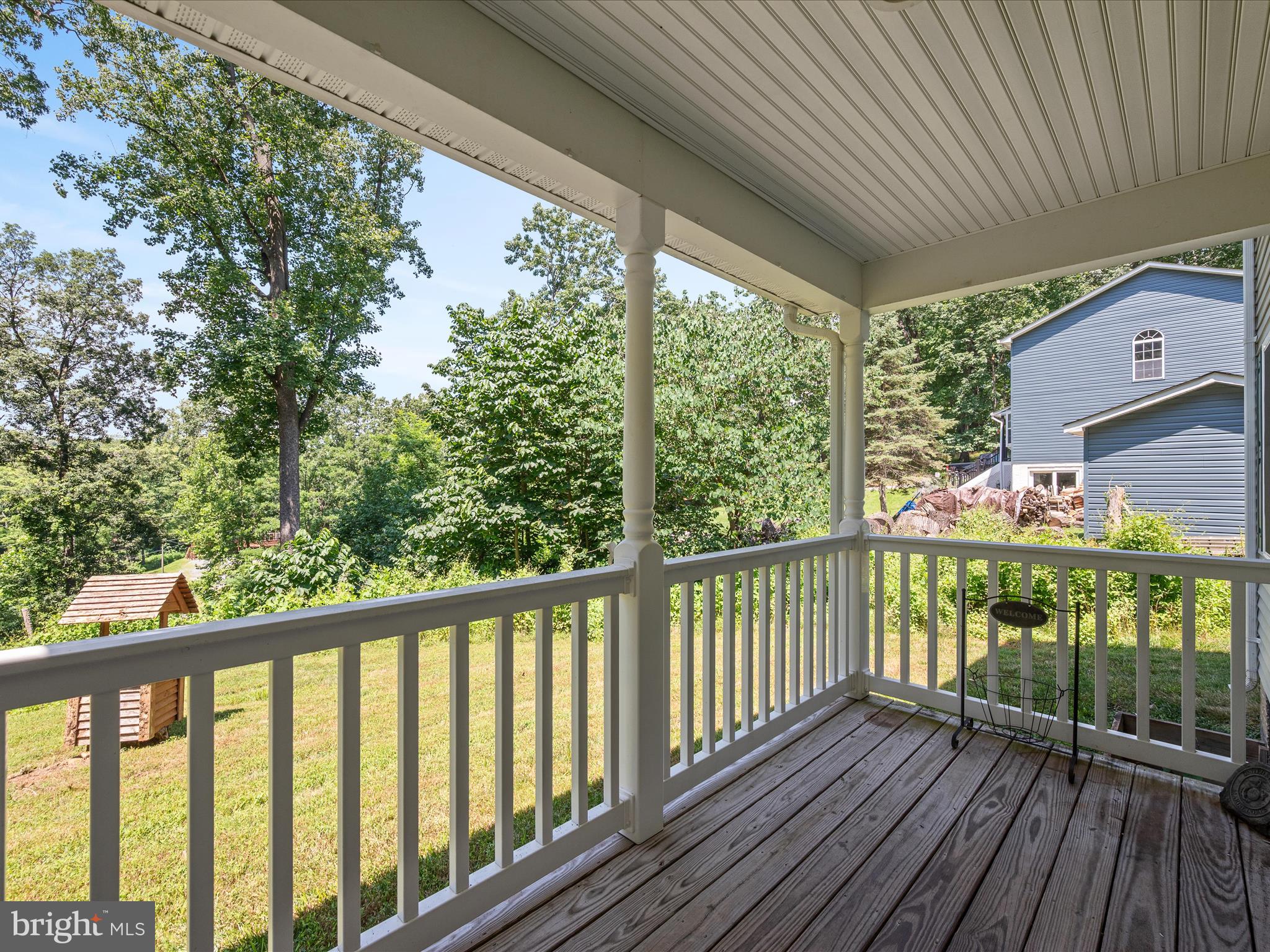 231 Greenfield Road Front Royal, VA 22630 - Photo 5 of 38 a view of a balcony with wooden floor
