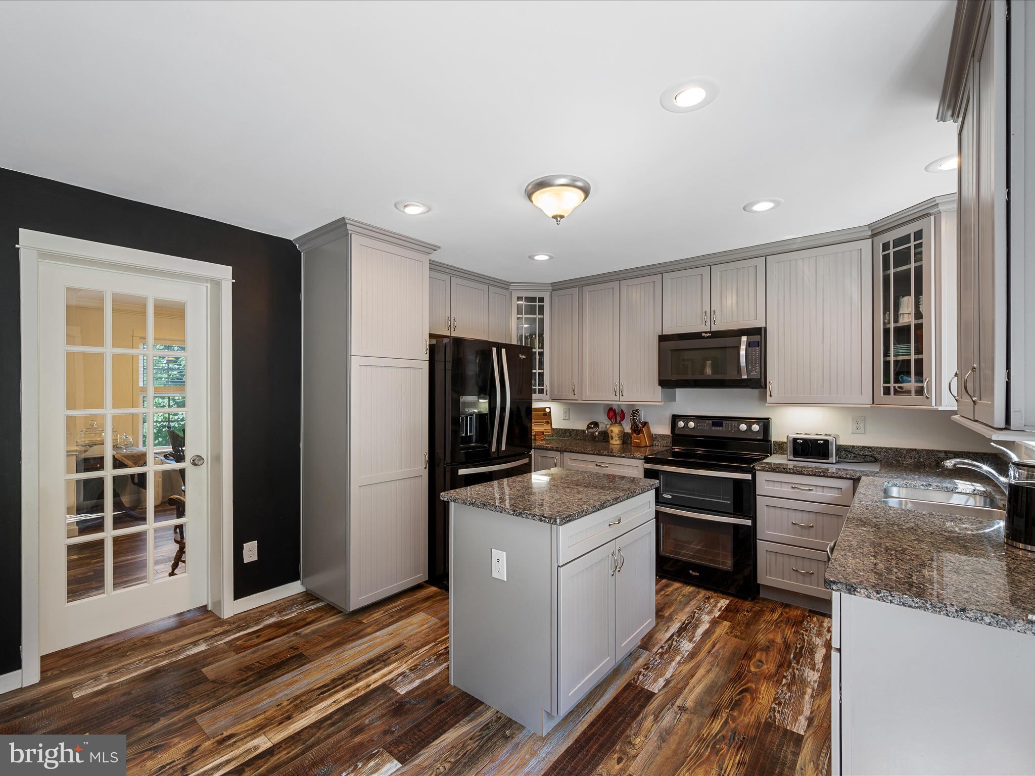 231 Greenfield Road Front Royal, VA 22630 - Photo 9 of 38 a kitchen with stainless steel appliances granite countertop a refrigerator stove microwave and sink