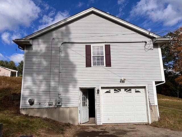 149 River Run Road Hardwick, MA 01031 - Photo 3 of 14 a front view of a house with garage
