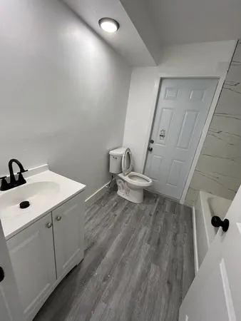 a bathroom with a sink and a toilet