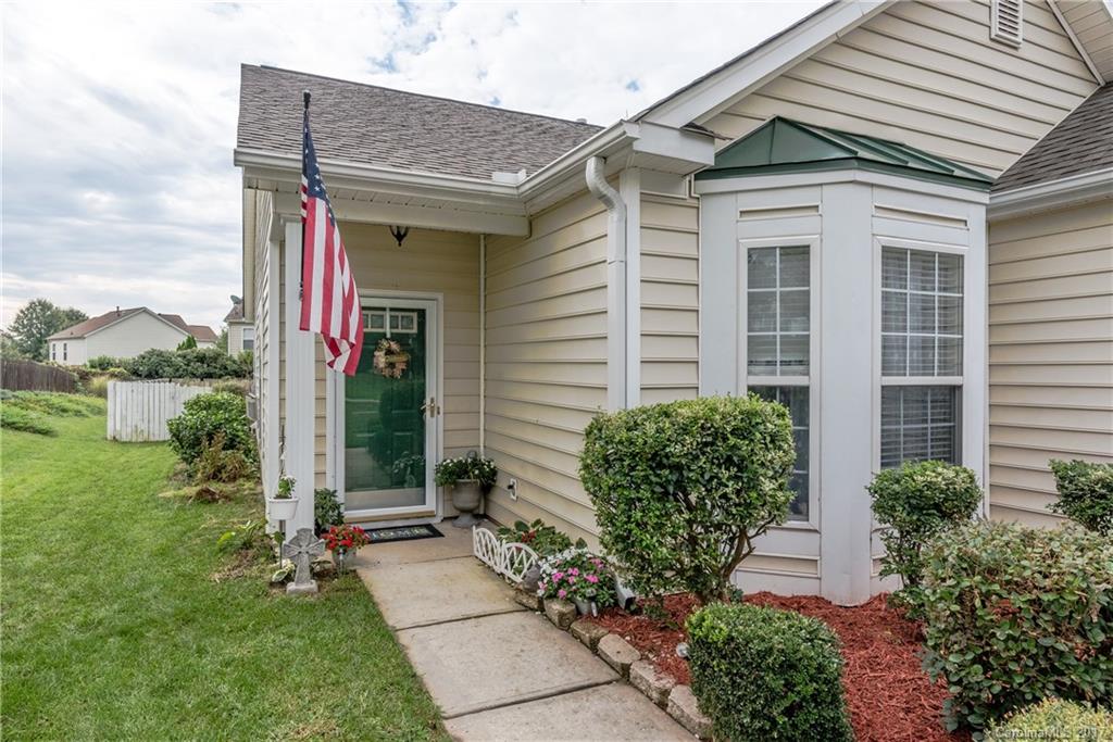 2531 Fossil Stone Lane Fort Mill, SC 29708 - Photo 2 of 21 a front view of a house with garden