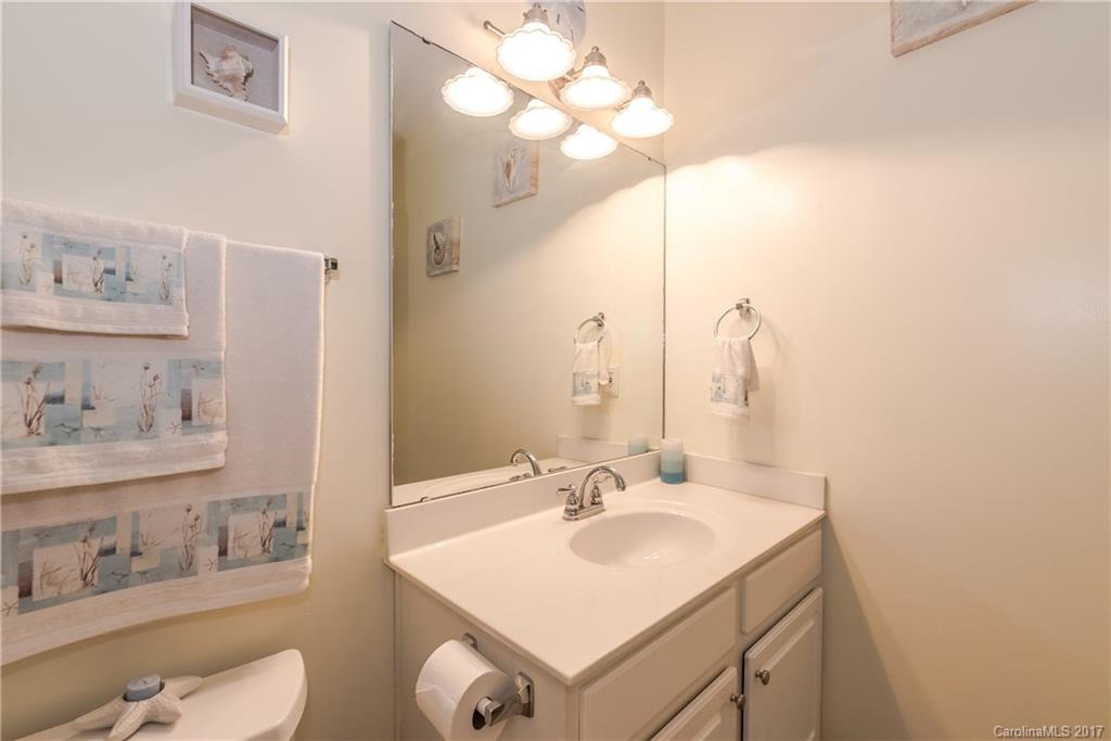 2531 Fossil Stone Lane Fort Mill, SC 29708 - Photo 18 of 21 a bathroom with a sink and a mirror