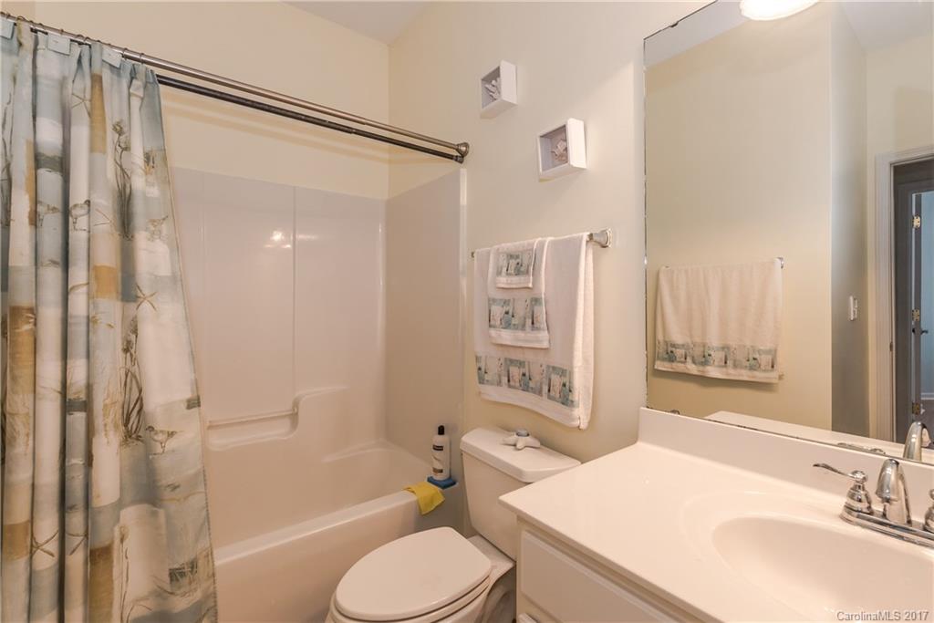 2531 Fossil Stone Lane Fort Mill, SC 29708 - Photo 19 of 21 a bathroom with a sink toilet tub and shower