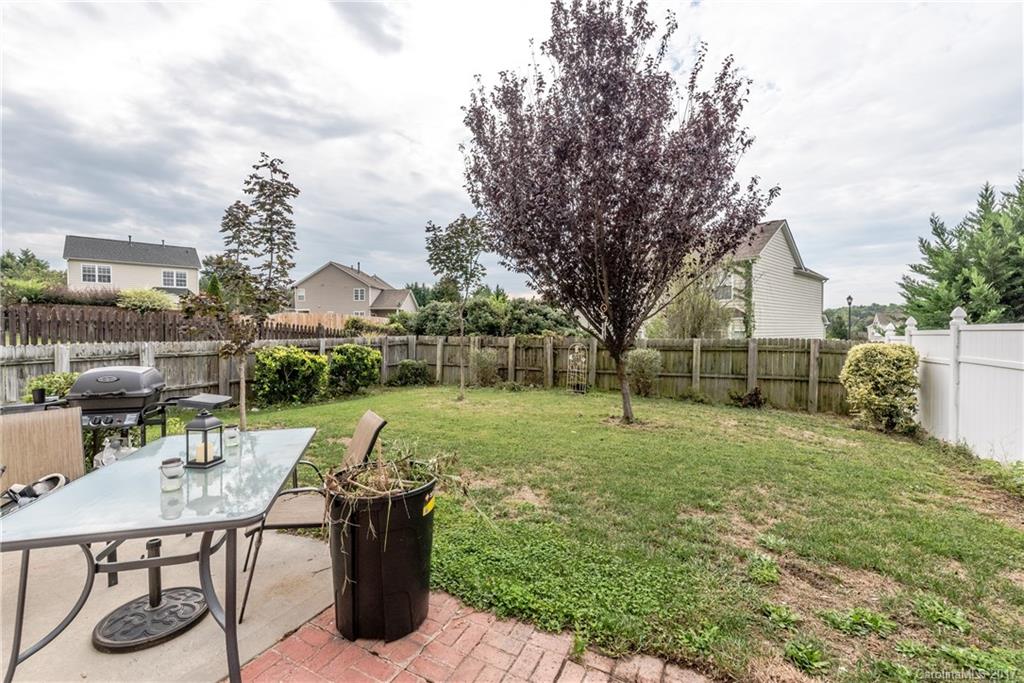 2531 Fossil Stone Lane Fort Mill, SC 29708 - Photo 20 of 21 a view of a backyard with furniture