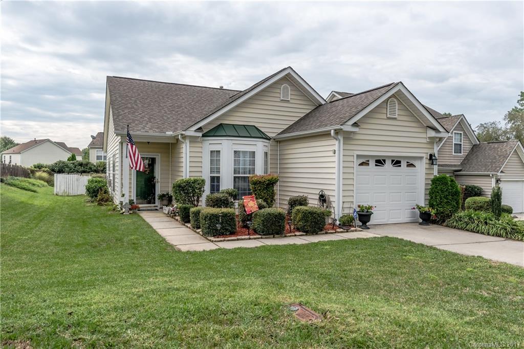 2531 Fossil Stone Lane Fort Mill, SC 29708 - Photo 21 of 21 a front view of house with yard and outdoor seating