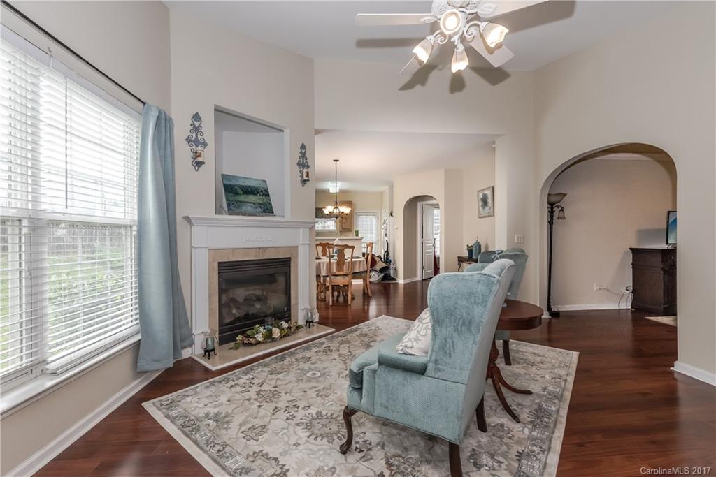 2531 Fossil Stone Lane Fort Mill, SC 29708 - Photo 5 of 21 a living room with furniture and a fireplace