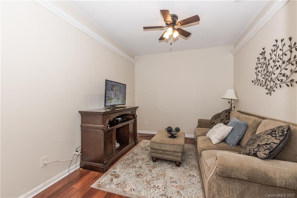 2531 Fossil Stone Lane Fort Mill, SC 29708 - Photo 6 of 21 a living room with furniture and wooden floor