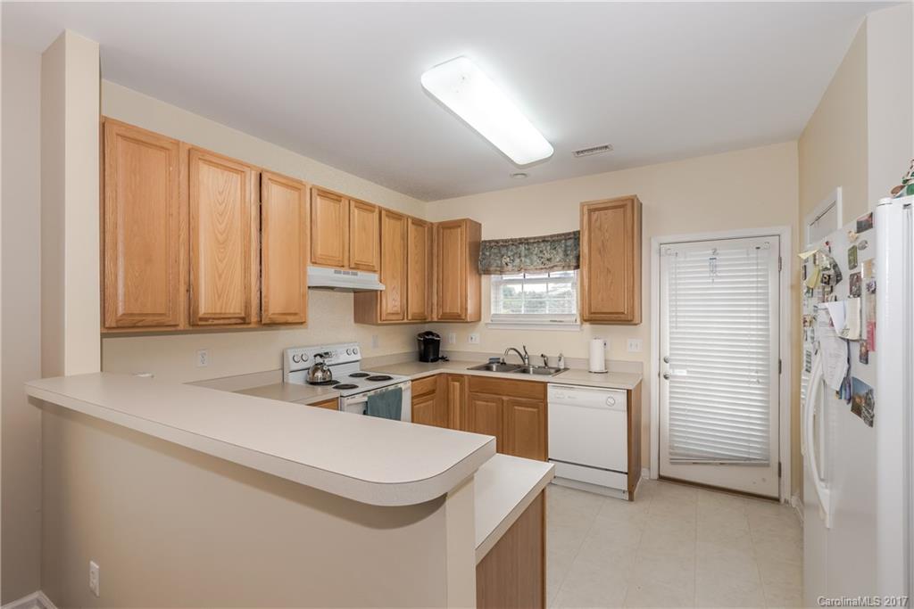 2531 Fossil Stone Lane Fort Mill, SC 29708 - Photo 9 of 21 a kitchen that has a sink and cabinets