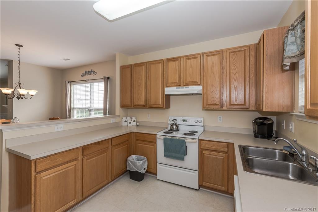 2531 Fossil Stone Lane Fort Mill, SC 29708 - Photo 10 of 21 a kitchen with a sink and cabinets