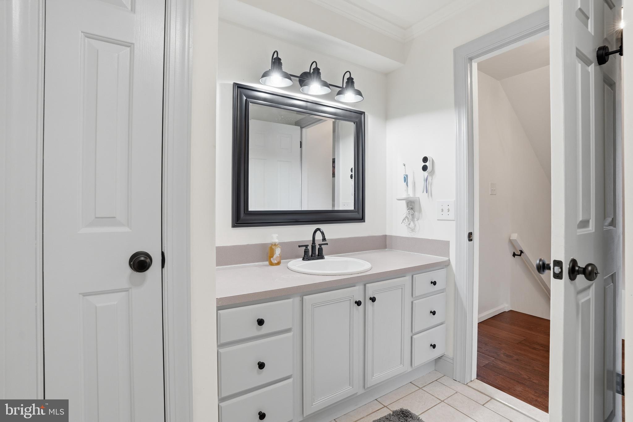 155 Nectar Run Telford, PA 18969 - Photo 21 of 32 a bathroom with a toilet sink and mirror