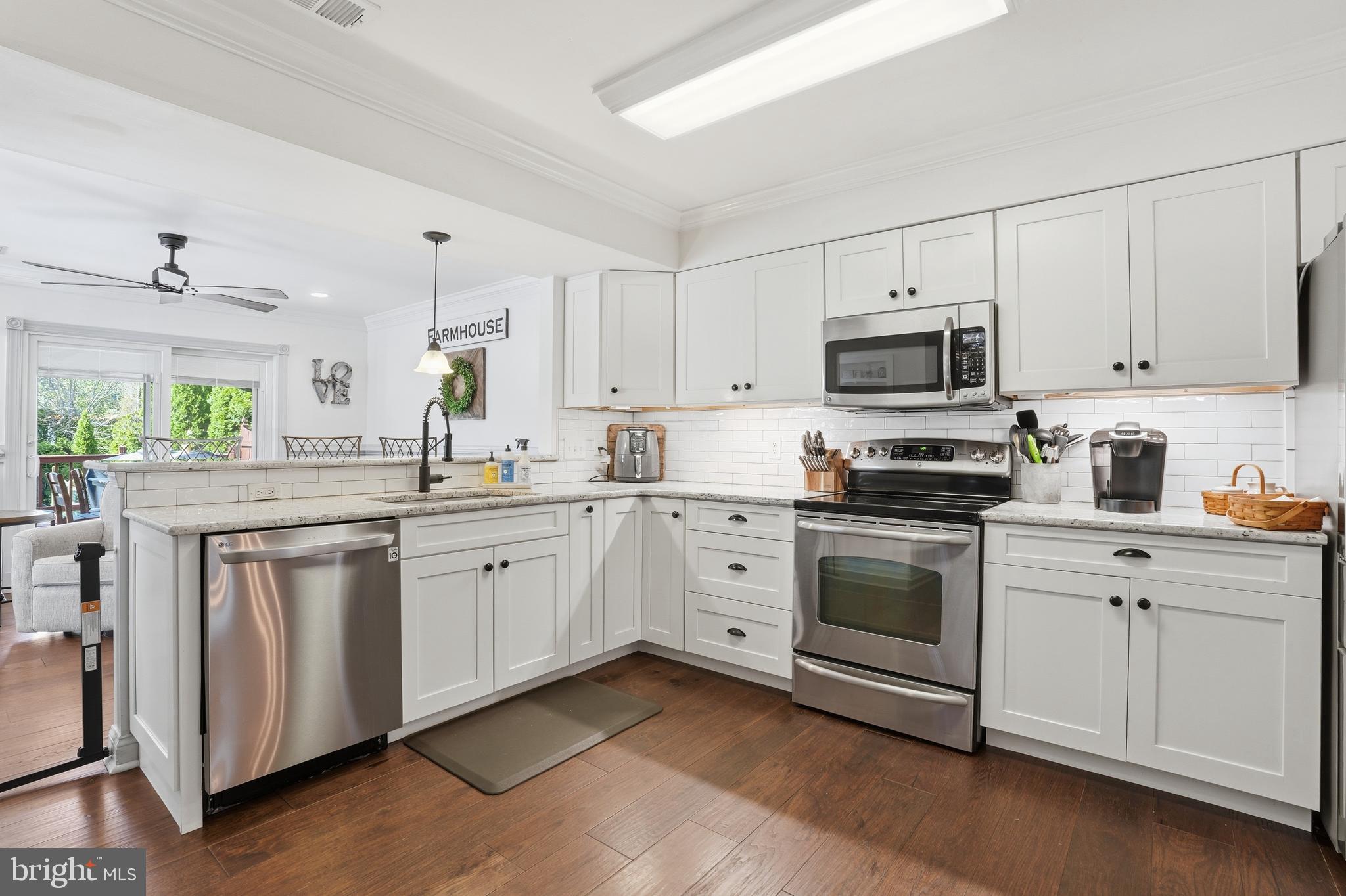 155 Nectar Run Telford, PA 18969 - Photo 9 of 32 a kitchen with cabinets stainless steel appliances a sink and a window