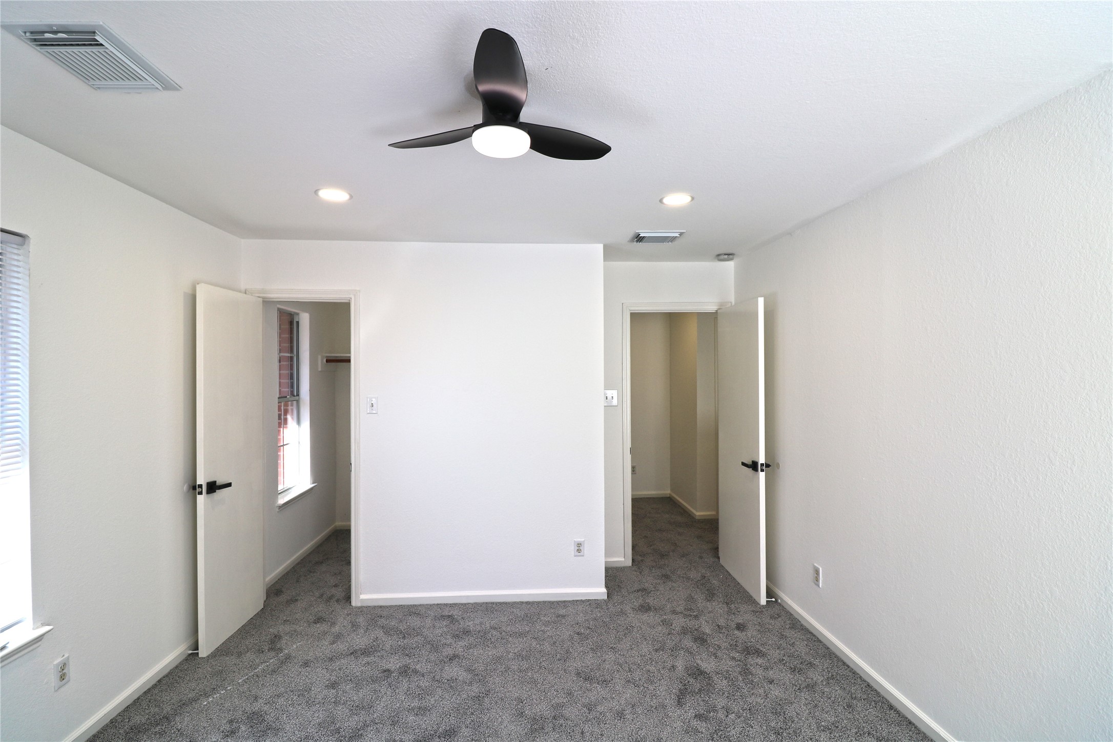 9611 Rads Point Sugar Land, TX 77498 - Photo 20 of 25 wooden floor in an empty room and a window