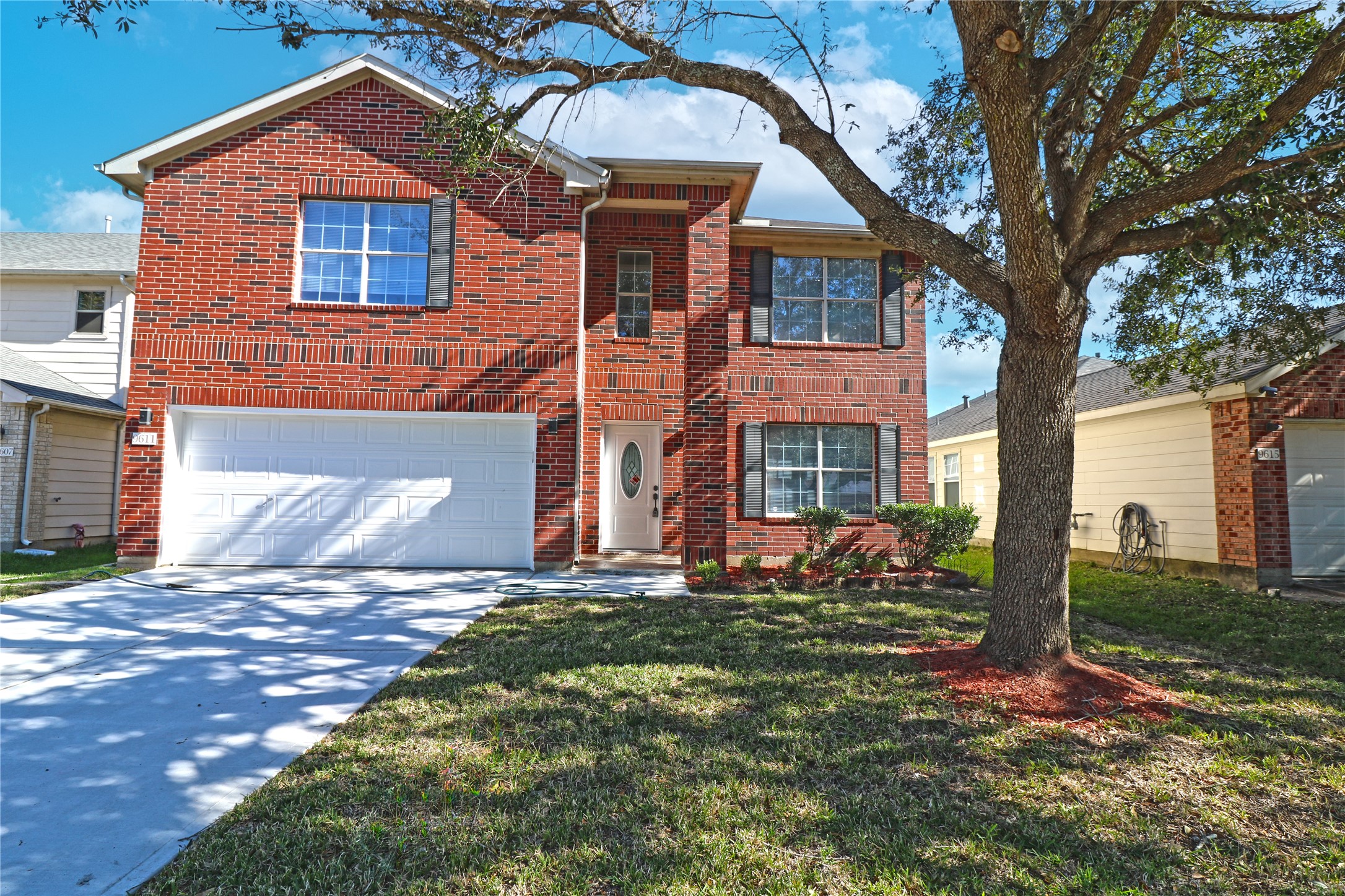 9611 Rads Point Sugar Land, TX 77498 - Photo 2 of 25 a front view of house with yard