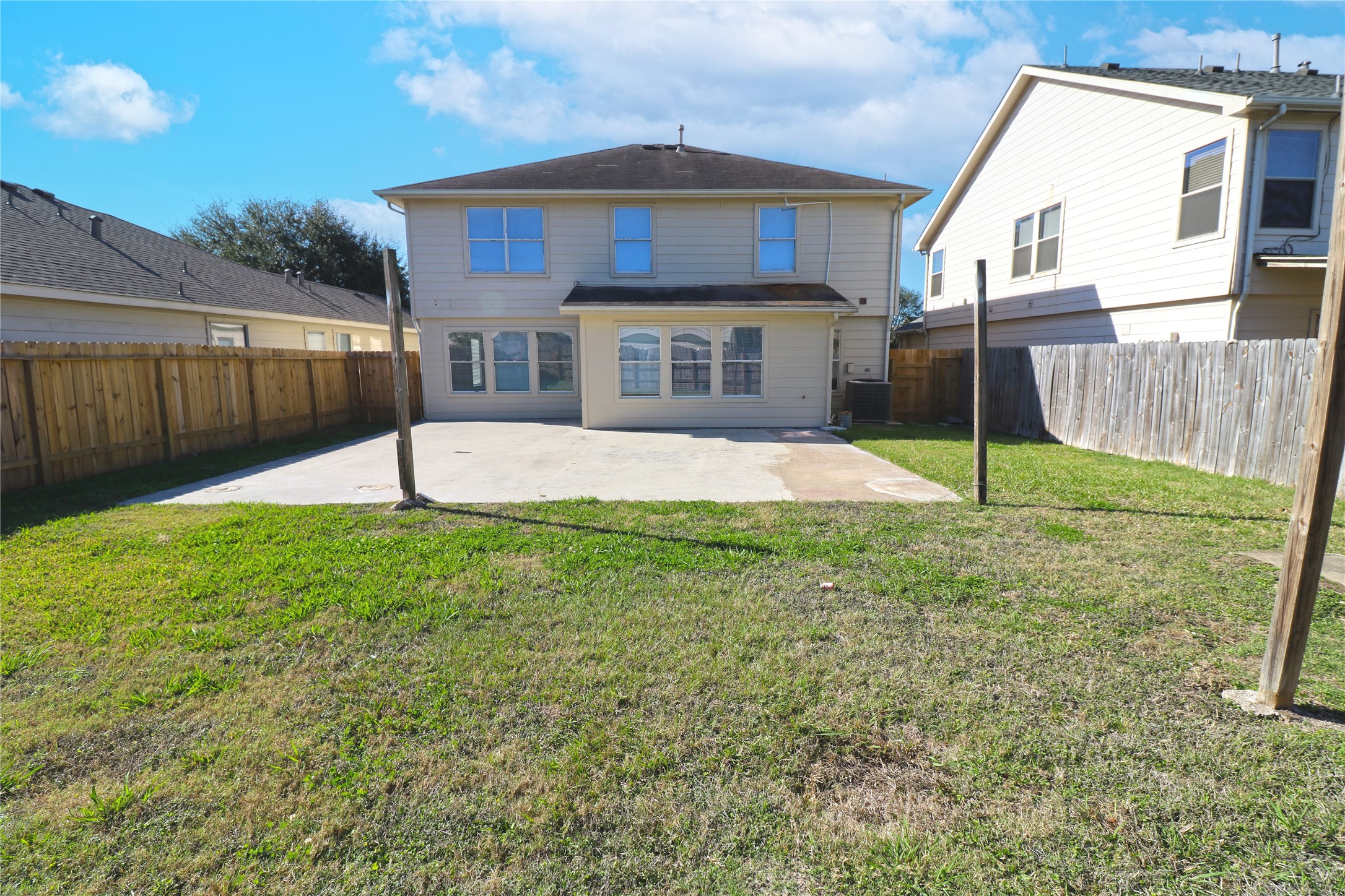 9611 Rads Point Sugar Land, TX 77498 - Photo 25 of 25 a front view of a house with a yard and garage
