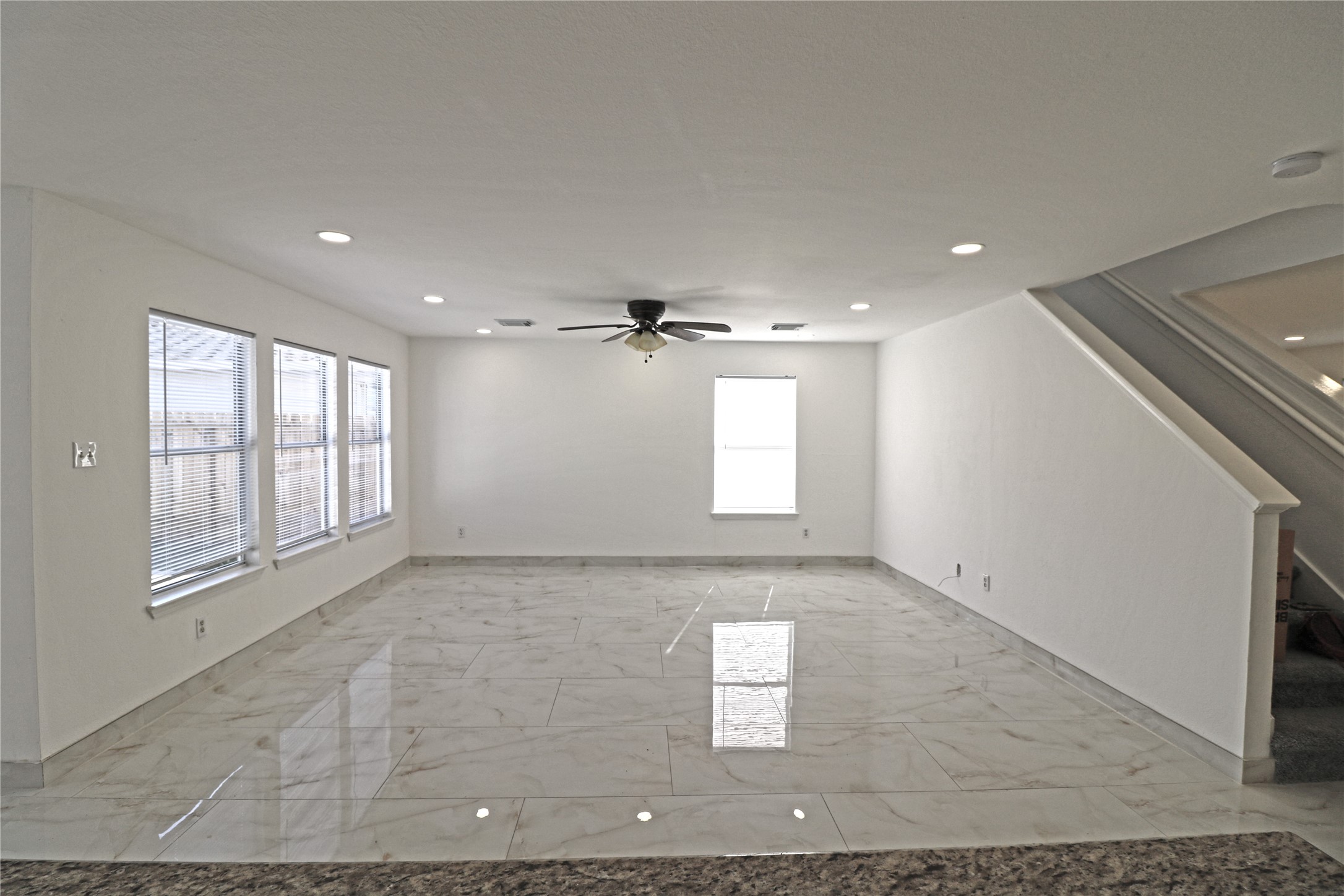 9611 Rads Point Sugar Land, TX 77498 - Photo 5 of 25 a view of an empty room with a window