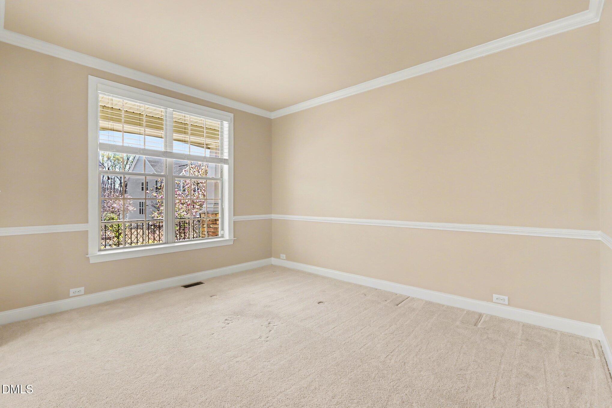 351 Gartrell Way Cary, NC 27519 - Photo 38 of 51 an empty room with a window
