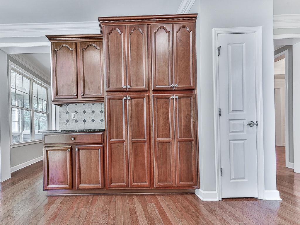 626 Laurel Crossing Canton, GA 30114 - Photo 25 of 77 an entryway with wooden floor