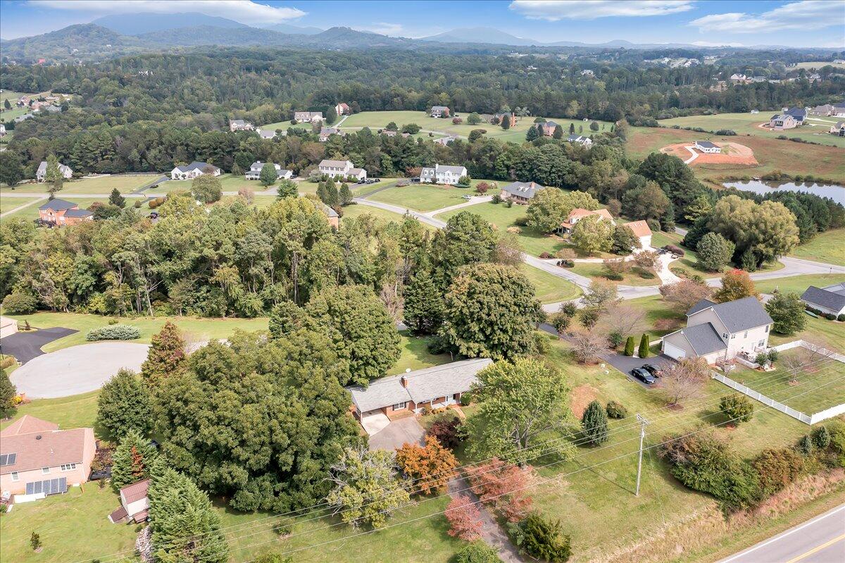 8450 Forest Road Goode, VA 24556 - Photo 14 of 49 an aerial view of residential houses with outdoor space