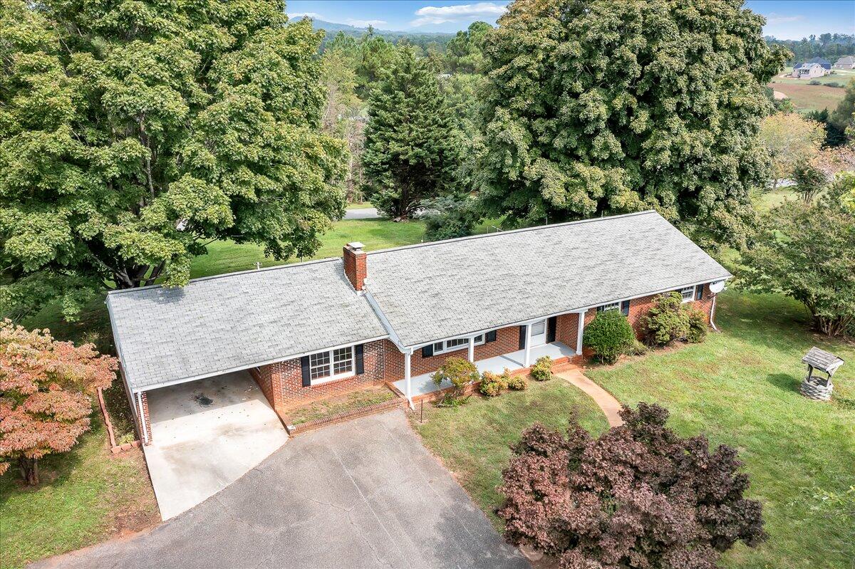 8450 Forest Road Goode, VA 24556 - Photo 3 of 49 an aerial view of a house with a yard