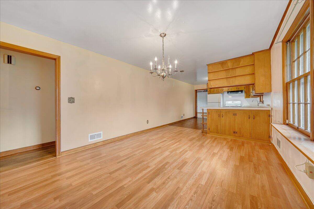 8450 Forest Road Goode, VA 24556 - Photo 25 of 49 a view of a room with wooden floor and staircase
