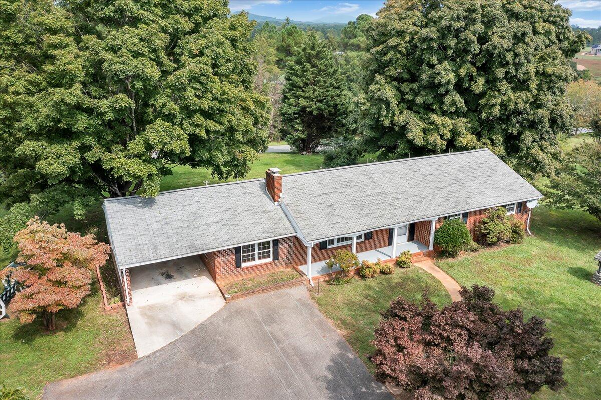 8450 Forest Road Goode, VA 24556 - Photo 4 of 49 an aerial view of a house with a yard