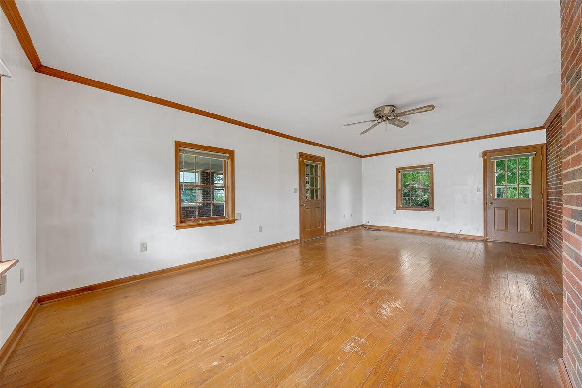 8450 Forest Road Goode, VA 24556 - Photo 31 of 49 a view of an empty room with windows