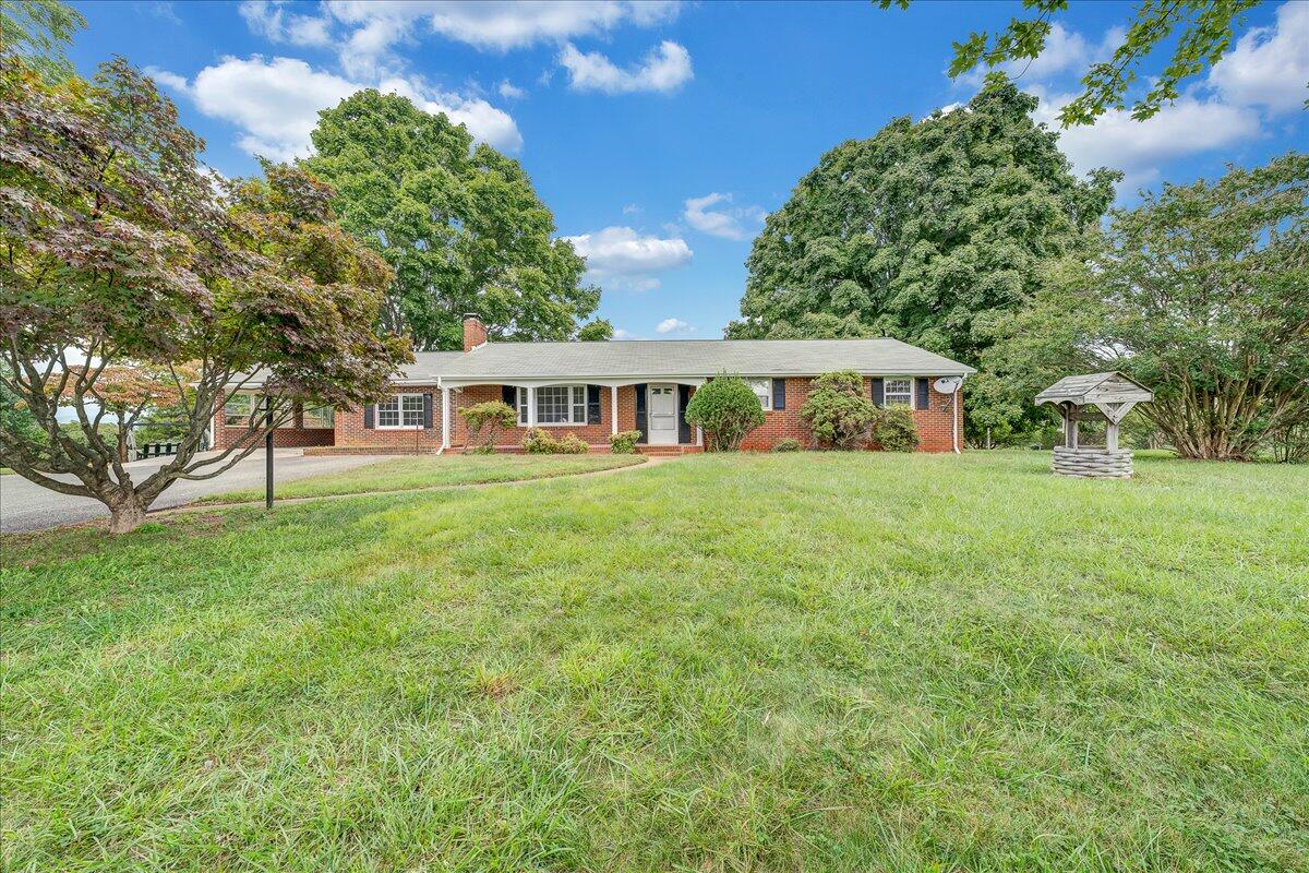 8450 Forest Road Goode, VA 24556 - Photo 5 of 49 a view of a house with a big yard
