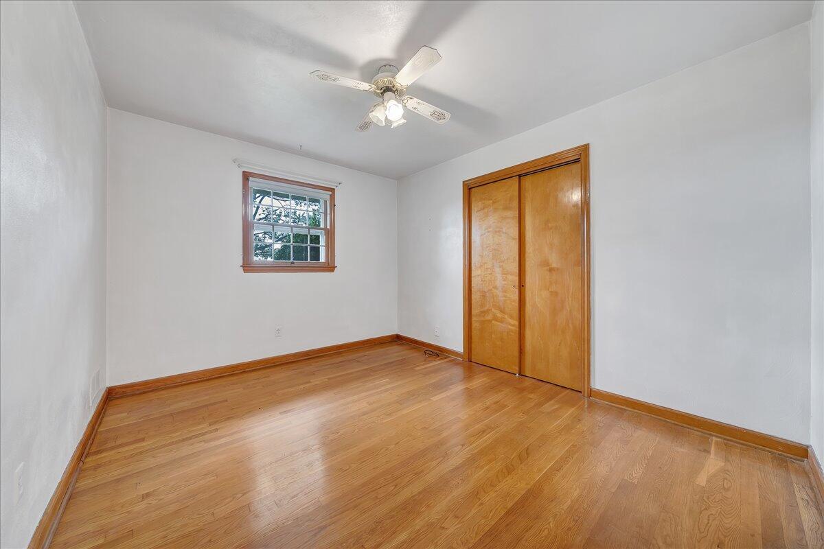 8450 Forest Road Goode, VA 24556 - Photo 43 of 49 an empty room with windows and closet