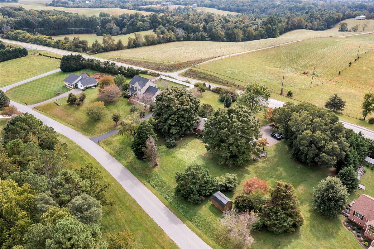 8450 Forest Road Goode, VA 24556 - Photo 9 of 49 a view of a lake with a yard