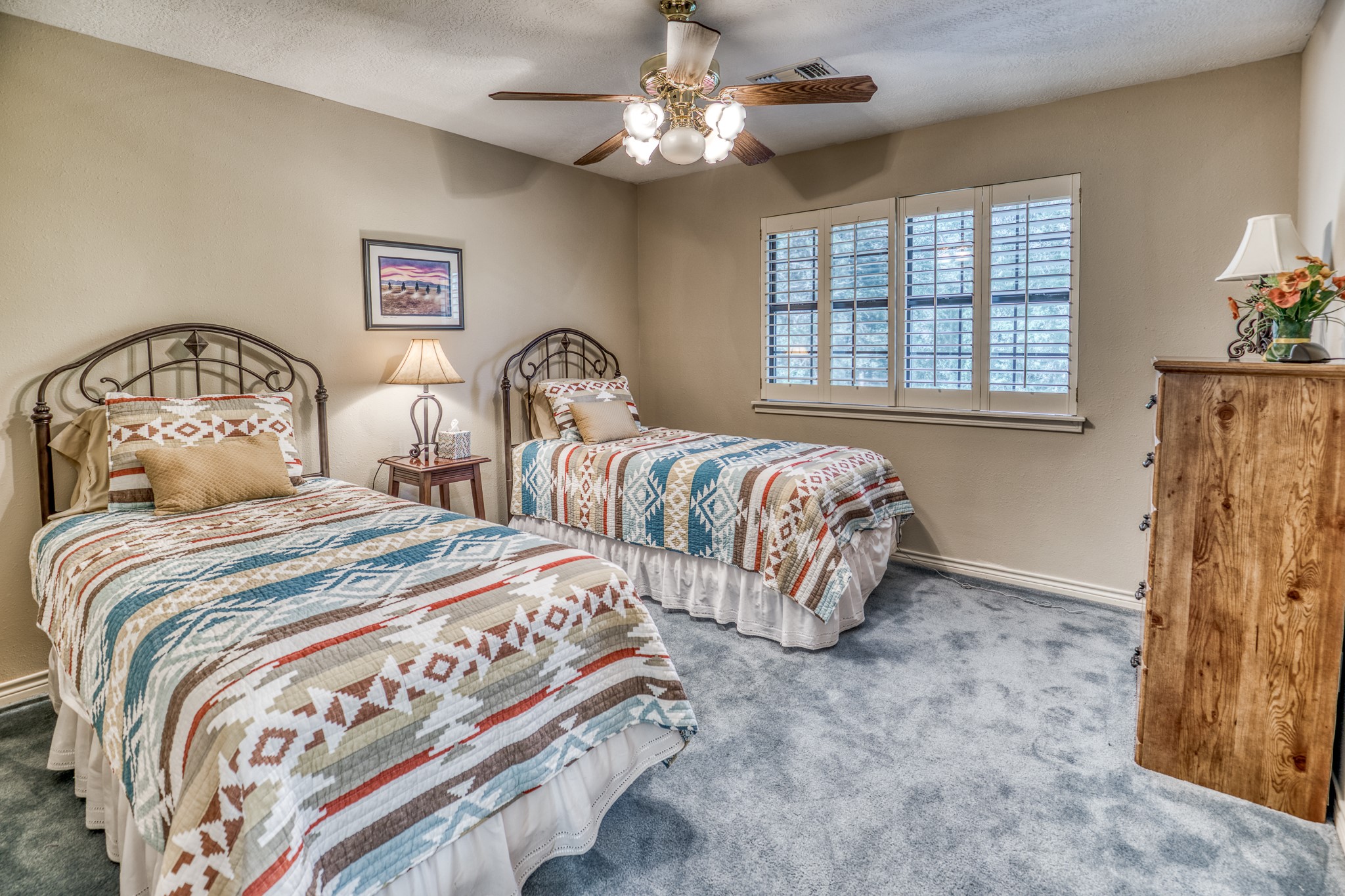 1017 Allen Road Cat Spring, TX 78933 - Photo 20 of 47 a bedroom with three beds and a window