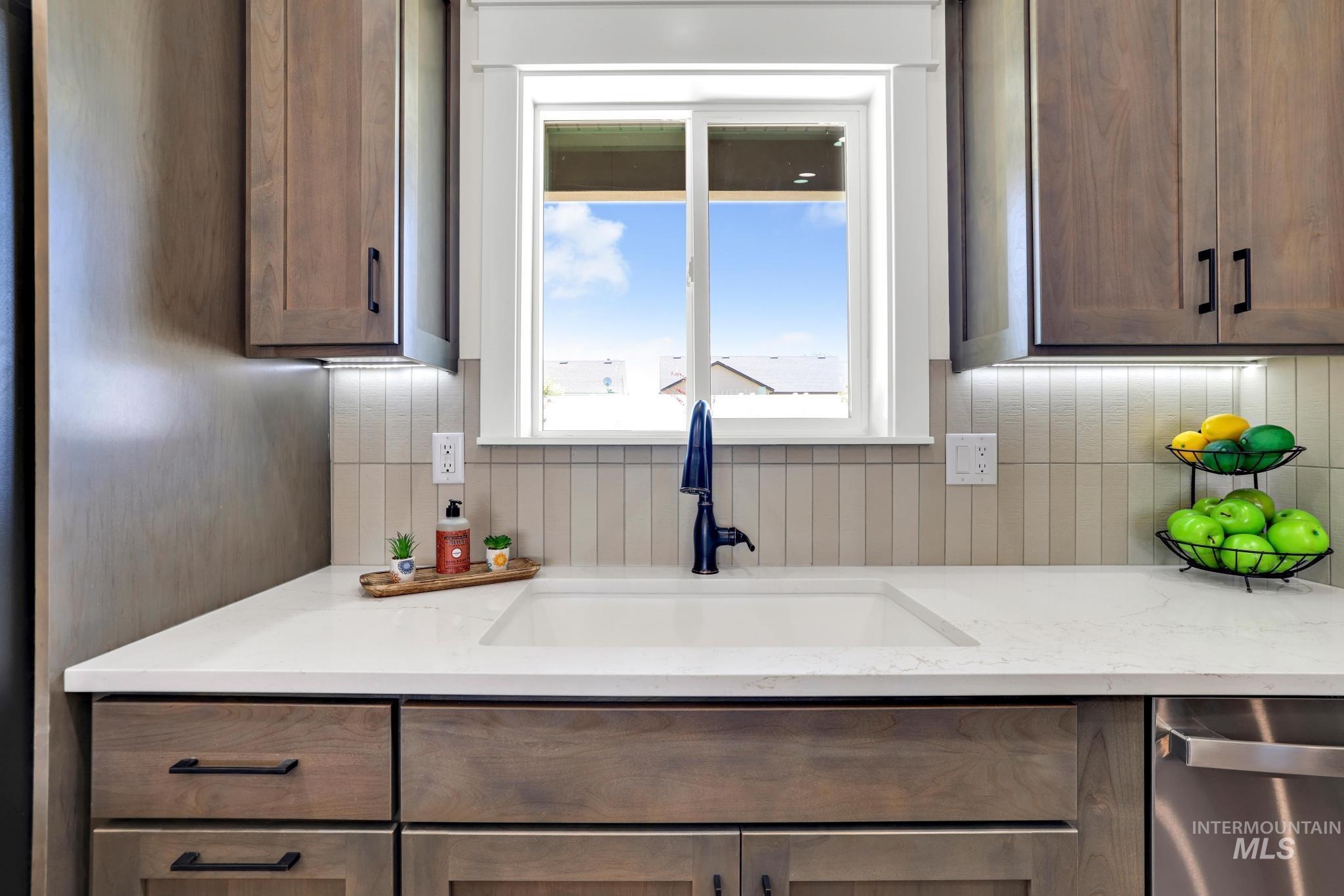 284 Sandi Road Twin Falls, ID 83301 - Photo 20 of 33 Bright room featuring a ceiling fan with integrated lighting, a recessed ceiling light, and a double-paned window with white trim